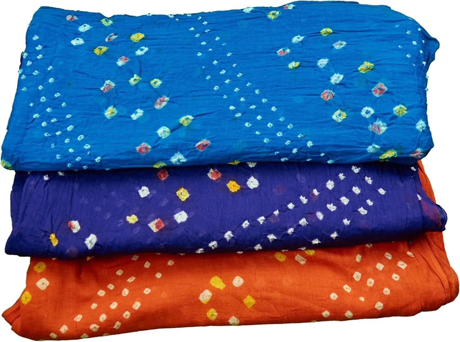 Multi-coloured Bandhani created through repeated tie-dye cycles in Kutch